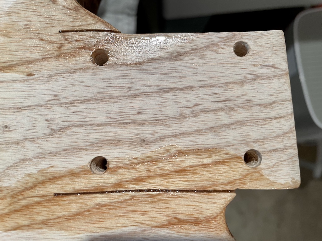 guitar neck pocket cut and filled with epoxy
